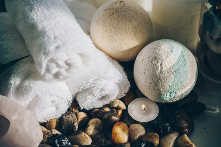 spa-candle-towel-and-stones